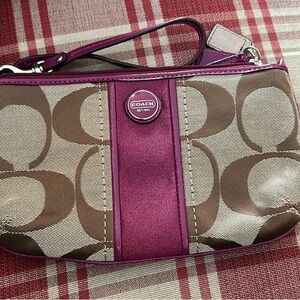 Coach wristlet w/ strap. Original tags still attached. Khaki/Passion Berry.